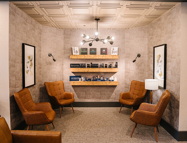 Office waiting area with leather chairs.